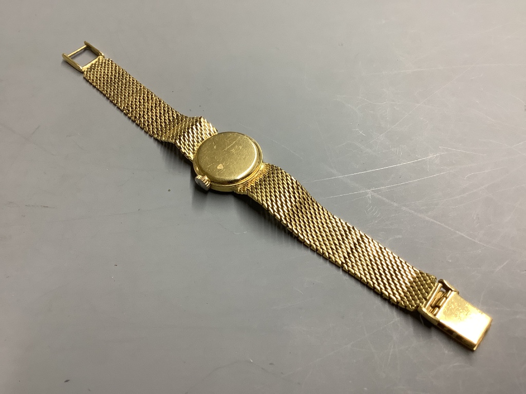 A vintage ladies' Omega 18ct gold ladys' wristwatch on integral mesh bracelet, total 28.7g